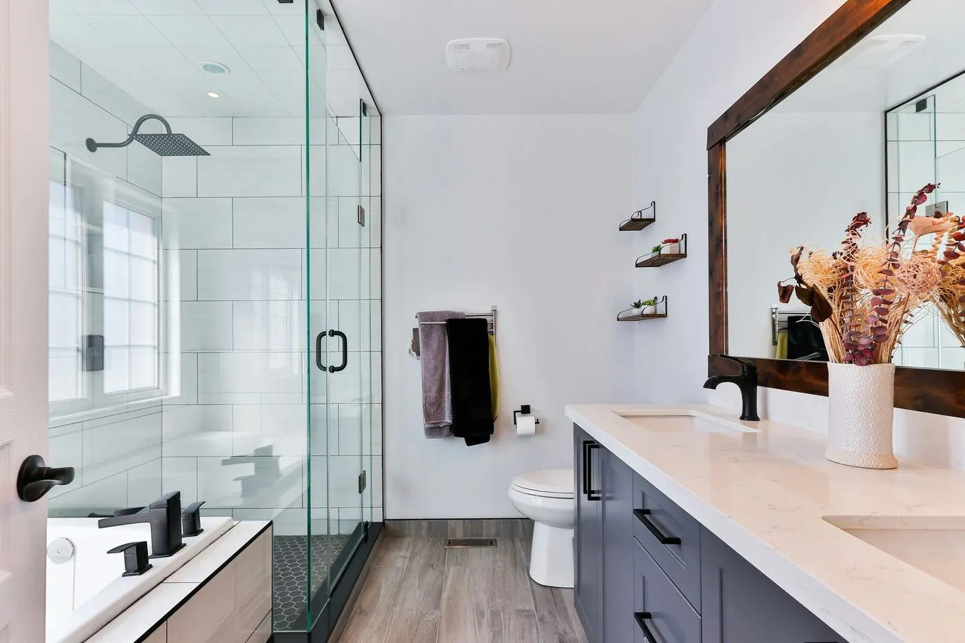 Remodeled bathroom with new tile and vanity